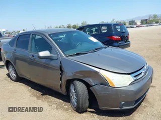 2009 Ford Focus SE with VIN 1FAHP35N69W244451, listed as a IAAI auction lot 42104982 with 199,524 mi miles. Bid and sale history available at carsss.com. Image 6.