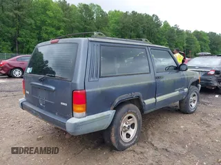 2001 Jeep Cherokee with VIN 1J4FT47S11L609530, listed as a IAAI auction lot 42222446 with 156,408 mi miles and . Bid and sale history available at DreamBid. Image 4.