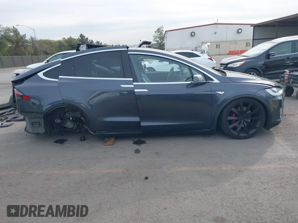 2016 Tesla Model X 70D with VIN 5YJXCAE27GF015175, listed as a IAAI auction lot 41074929 with 115,130 mi miles. Bid and sale history available at carsss.com. Image 14.