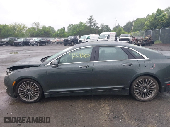2015 Lincoln MKZ Hybrid z VIN 3LN6L2LU7FR618867, wystawiony jako IAAI lot #42291650 z przebiegiem 109 021 mil mil oraz . Historia ofert i sprzedaży dostępna na DreamBid. Obrazek 14.