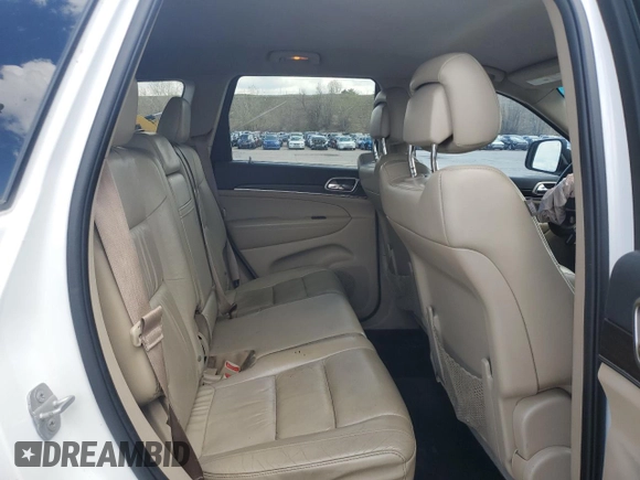 2014 Jeep Grand Cherokee Limited z VIN 1C4RJFBG5EC545425, wystawiony jako Copart lot #54035445 z przebiegiem 135 309 mil mil oraz Szkoda całkowita • Salvage title. Historia ofert i sprzedaży dostępna na DreamBid. Obrazek 11.