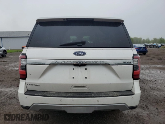 2019 Ford Expedition Max Limited with VIN 1FMJK2AT4KEA03732, listed as a Copart auction lot 55733215 with 76,962 mi miles and Salvage title. Bid and sale history available at DreamBid. Image 6.
