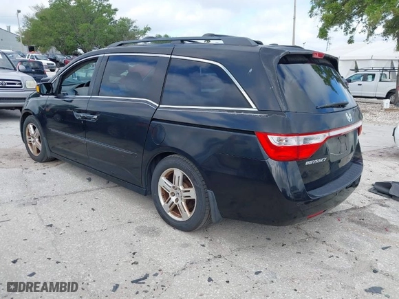 2013 Honda Odyssey Touring with VIN 5FNRL5H92DB003200, listed as a IAAI auction lot 41920237 with 167,483 mi miles. Bid and sale history available at carsss.com. Image 3.