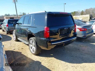 2020 Chevrolet Tahoe LTZ with VIN 1GNSCCKCXLR106732, listed as a IAAI auction lot 41486660 with Not provided miles and . Bid and sale history available at DreamBid. Image 3.