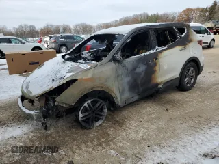 2018 Hyundai Santa Fe 2.4L z VIN 5NMZTDLB0JH106971, wystawiony jako Copart lot #88657535 z przebiegiem Nie podano mil oraz Szkoda całkowita • Salvage title. Historia ofert i sprzedaży dostępna na DreamBid. Obrazek 1.