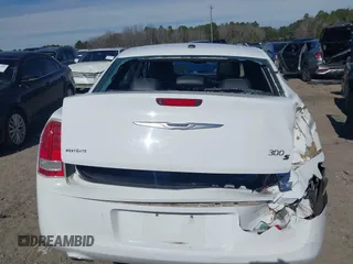 2013 Chrysler 300 with VIN 2C3CCABGXDH699096, listed as a IAAI auction lot 41614034 with 136,344 mi miles. Bid and sale history available at carsss.com. Image 12.