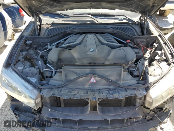2017 BMW X5 xDrive50i z VIN 5UXKR6C39H0U13732, wystawiony jako Copart lot #49181165 z przebiegiem 129 644 mil mil oraz Szkoda całkowita • Salvage title. Historia ofert i sprzedaży dostępna na DreamBid. Obrazek 12.
