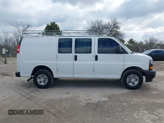 2018 Chevrolet Express Cargo Van with VIN 1GCWGAFP6J1336229, listed as a IAAI auction lot 42022722 with 99,005 mi miles. Bid and sale history available at carsss.com. Image 13.
