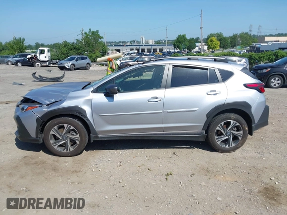 2024 Subaru Crosstrek Premium z VIN JF2GUADC1R8236332, wystawiony jako IAAI lot #42582230 z przebiegiem Nie podano mil oraz . Historia ofert i sprzedaży dostępna na DreamBid. Obrazek 13.