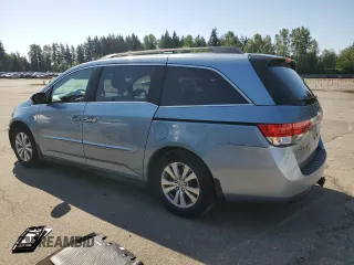 2014 Honda Odyssey EX-L with VIN 5FNRL5H62EB040061, listed as a Copart auction lot 54880355 with 178,179 mi miles and Salvage Title. Bid and sale history available at carsss.com. Image 2.