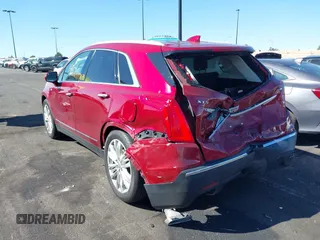 2019 Cadillac XT5 Premium Luxury FWD with VIN 1GYKNERS4KZ174349, listed as a IAAI auction lot 41614364 with 104,979 mi miles and . Bid and sale history available at DreamBid. Image 14.
