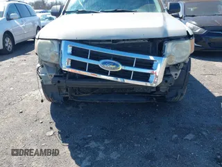 2008 Ford Escape XLT with VIN 1FMCU93198KC12899, listed as a IAAI auction lot 41768951 with 202,830 mi miles. Bid and sale history available at carsss.com. Image 6.