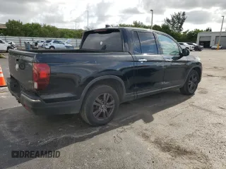 2019 Honda Ridgeline Sport with VIN 5FPYK2F15KB003142, listed as a Copart auction lot 57058235 with 173,049 mi miles and Clean title. Bid and sale history available at DreamBid. Image 3.