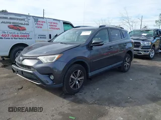 2018 Toyota RAV4 XLE with VIN JTMWFREV1JJ169926, listed as a IAAI auction lot 41464920 with 111,144 mi miles. Bid and sale history available at carsss.com. Image 17.