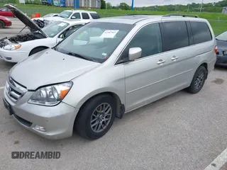2007 Honda Odyssey Touring z VIN 5FNRL38877B091046, wystawiony jako IAAI lot #42187965 z przebiegiem Nie podano mil oraz . Historia ofert i sprzedaży dostępna na DreamBid. Obrazek 17.