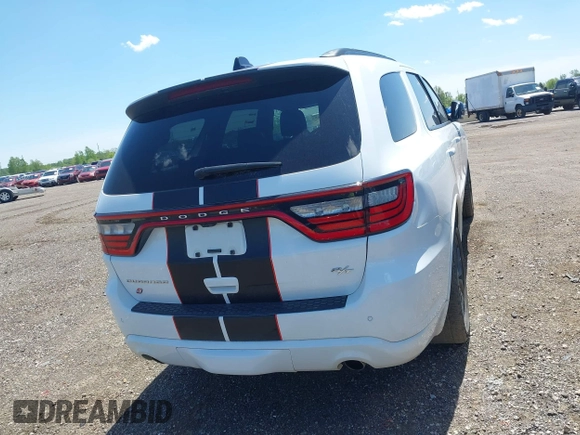 2023 Dodge Durango R/T Plus with VIN 1C4SDJCTXPC553725, listed as a IAAI auction lot 42290693 with 74,995 mi miles and . Bid and sale history available at DreamBid. Image 16.