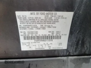 2016 Ford Taurus Limited z VIN 1FAHP2F84GG113318, wystawiony jako Copart lot #55733245 z przebiegiem 82 246 mil mil oraz Szkoda całkowita • Salvage title. Historia ofert i sprzedaży dostępna na DreamBid. Obrazek 13.