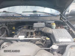 2003 Jeep Grand Cherokee Laredo with VIN 1J4GW48S03C557756, listed as a IAAI auction lot 42507884 with 195,236 mi miles and . Bid and sale history available at DreamBid. Image 10.