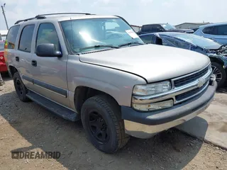 2004 Chevrolet Tahoe LS z VIN 1GNEC13T44R180732, wystawiony jako IAAI lot #42170904 z przebiegiem Nie podano mil oraz . Historia ofert i sprzedaży dostępna na DreamBid. Obrazek 1.