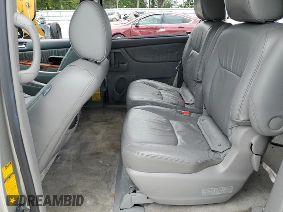 2010 Toyota Sienna XLE with VIN 5TDYK4CC1AS322395, listed as a Copart auction lot 60520215 with 148,725 mi miles and Salvage title. Bid and sale history available at DreamBid. Image 11.