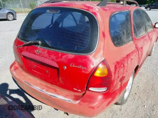 1997 Hyundai Elantra z VIN KMHJW34M1VU075495, wystawiony jako IAAI lot #42430074 z przebiegiem 207 458 mil mil oraz . Historia ofert i sprzedaży dostępna na DreamBid. Obrazek 14.