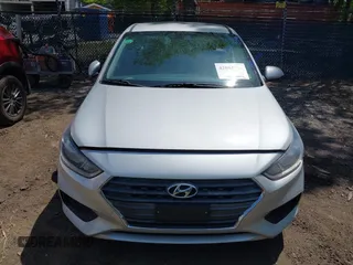 2018 Hyundai Accent SE z VIN 3KPC24A30JE018627, wystawiony jako IAAI lot #42084881 z przebiegiem 123 889 mil mil oraz . Historia ofert i sprzedaży dostępna na DreamBid. Obrazek 12.