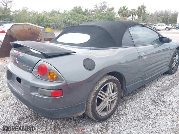2003 Mitsubishi Eclipse GT with VIN 4A3AE55HX3E174745, listed as a IAAI auction lot 41303685 with 103,147 mi miles. Bid and sale history available at carsss.com. Image 4.