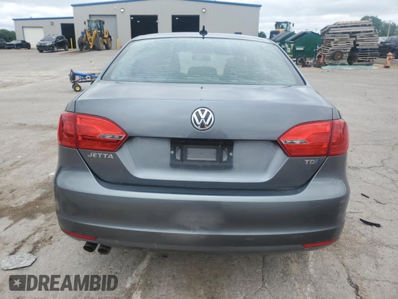 2014 Volkswagen Jetta TDI w/Premium/Nav z VIN 3VWLL7AJ1EM430822, wystawiony jako Copart lot #57405845 z przebiegiem 112 178 mil mil oraz Szkoda całkowita • Salvage title. Historia ofert i sprzedaży dostępna na DreamBid. Obrazek 6.