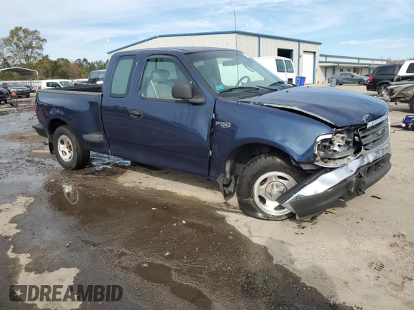 2003 Ford F-150 XL with VIN 1FTRX07273KB66549, listed as a Copart auction lot 83552004 with 205,026 mi miles and Salvage title. Bid and sale history available at DreamBid. Image 4.
