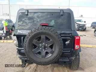 2023 Ford Bronco z VIN 1FMDE5BHOPLB83665, wystawiony jako IAAI lot #41520897 z przebiegiem 16 678 mil mil oraz . Historia ofert i sprzedaży dostępna na DreamBid. Obrazek 17.