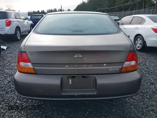 1999 Nissan Altima XE with VIN 1N4DL01D1XC210017, listed as a IAAI auction lot 41199544 with 297,917 mi miles. Bid and sale history available at carsss.com. Image 16.