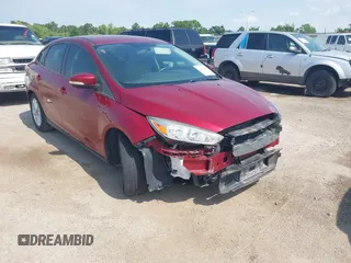 2016 Ford Focus SE with VIN 1FADP3F2XGL360074, listed as a IAAI auction lot 42433749 with 71,542 mi miles and . Bid and sale history available at DreamBid. Image 1.