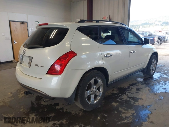 2003 Nissan Murano SL with VIN JN8AZ08W13W214133, listed as a IAAI auction lot 42057504 with 163,751 mi miles and . Bid and sale history available at DreamBid. Image 4.