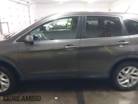 2015 Honda CR-V EX with VIN 2HKRM4H56FH662101, listed as a IAAI auction lot 41623155 with 173,554 mi miles and . Bid and sale history available at DreamBid. Image 15.