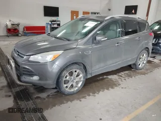 2014 Ford Escape Titanium with VIN 1FMCU9J90EUC31625, listed as a IAAI auction lot 41492075 with 301,917 mi miles and . Bid and sale history available at DreamBid. Image 17.