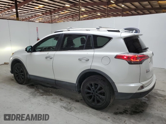2016 Toyota RAV4 Limited with VIN 2T3YFREV3GW293988, listed as a Copart auction lot 58768425 with 140,214 mi miles and Clean title. Bid and sale history available at DreamBid. Image 2.