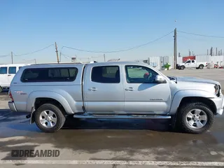 2013 Toyota Tacoma PreRunner with VIN 3TMKU4HN8DM034338, listed as a IAAI auction lot 41808842 with 142,012 mi miles and . Bid and sale history available at DreamBid. Image 13.
