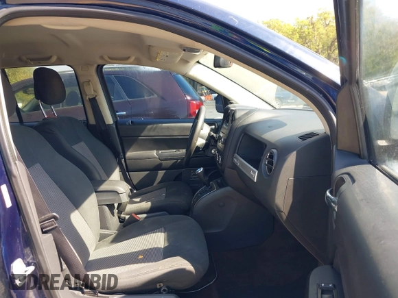 2014 Jeep Compass Sport with VIN 1C4NJCBB0ED660610, listed as a IAAI auction lot 40506737 with 209,670 mi miles. Bid and sale history available at carsss.com. Image 5.