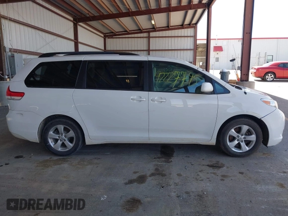 2014 Toyota Sienna LE AAS with VIN 5TDKK3DC2ES434546, listed as a IAAI auction lot 42227745 with 175,445 mi miles and . Bid and sale history available at DreamBid. Image 13.