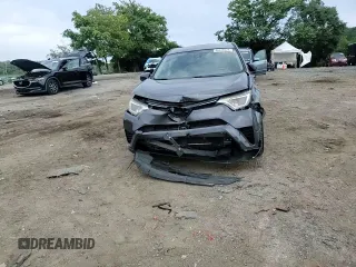 2018 Toyota RAV4 LE z VIN JTMBFREV1JJ219111, wystawiony jako Copart lot #69426224 z przebiegiem 89 555 mil mil oraz Nie do naprawy • Non repairable. Historia ofert i sprzedaży dostępna na DreamBid. Obrazek 11.