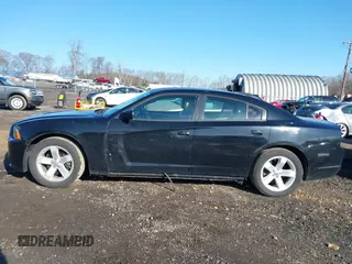 2014 Dodge Charger SE with VIN 2C3CDXBG5EH104852, listed as a IAAI auction lot 41866085 with 170,040 mi miles and . Bid and sale history available at carsss.com. Image 14.