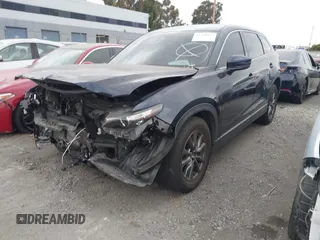 2021 Mazda CX-9 Touring with VIN JM3TCACY9M0526880, listed as a IAAI auction lot 42310923 with 25,991 mi miles and . Bid and sale history available at DreamBid. Image 20.