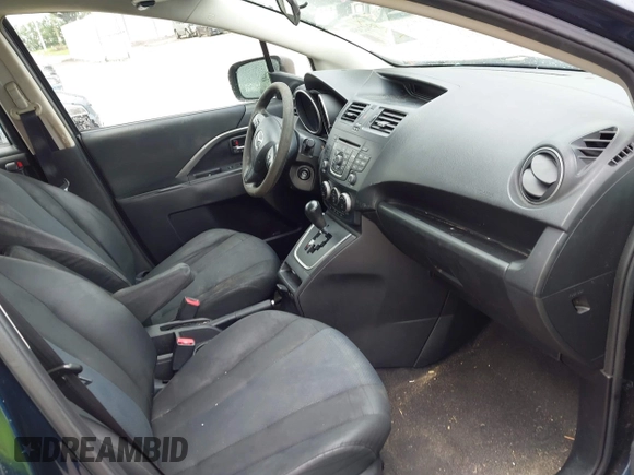 2014 Mazda 5 Sport with VIN JM1CW2BL6E0169672, listed as a IAAI auction lot 42422459 with 212,179 mi miles and . Bid and sale history available at DreamBid. Image 5.