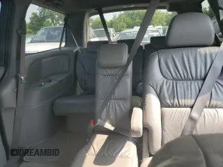 2010 Honda Odyssey EX-L z VIN 5FNRL3H73AB089714, wystawiony jako Copart lot #60276305 z przebiegiem 125 025 mil mil oraz Szkoda całkowita • Salvage title. Historia ofert i sprzedaży dostępna na DreamBid. Obrazek 10.