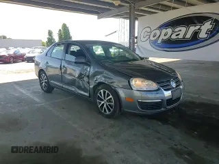 2010 Volkswagen Jetta S with VIN 3VWJZ7AJ9AM052569, listed as a Copart auction lot 59016965 with 166,950 mi miles and Salvage title. Bid and sale history available at DreamBid. Image 13.