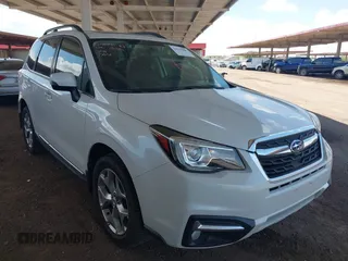 2018 Subaru Forester Touring z VIN JF2SJAWC6JH580632, wystawiony jako IAAI lot #42237986 z przebiegiem 38 446 mil mil oraz . Historia ofert i sprzedaży dostępna na DreamBid. Obrazek 1.