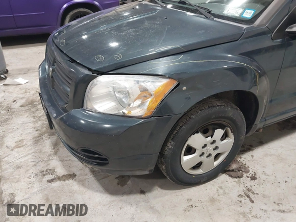 2007 Dodge Caliber with VIN 1B3HB28B27D321850, listed as a IAAI auction lot 41617311 with 180,446 mi miles. Bid and sale history available at carsss.com. Image 6.