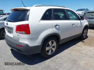 2013 Kia Sorento EX with VIN 5XYKUDA64DG370245, listed as a IAAI auction lot 42688504 with 172,060 mi miles and . Bid and sale history available at DreamBid. Image 4.
