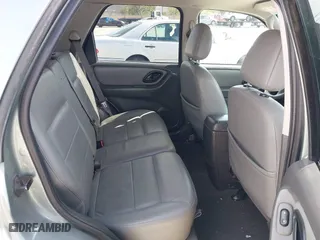 2007 Ford Escape Hybrid with VIN 1FMCU59H37KA92464, listed as a IAAI auction lot 42001479 with 159,147 mi miles. Bid and sale history available at carsss.com. Image 8.