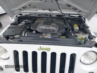 2014 Jeep Wrangler Unlimited Rubicon with VIN 1C4HJWFG4EL104827, listed as a IAAI auction lot 42236622 with 90,935 mi miles and . Bid and sale history available at DreamBid. Image 10.